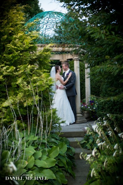 Couple surrounded by greenery